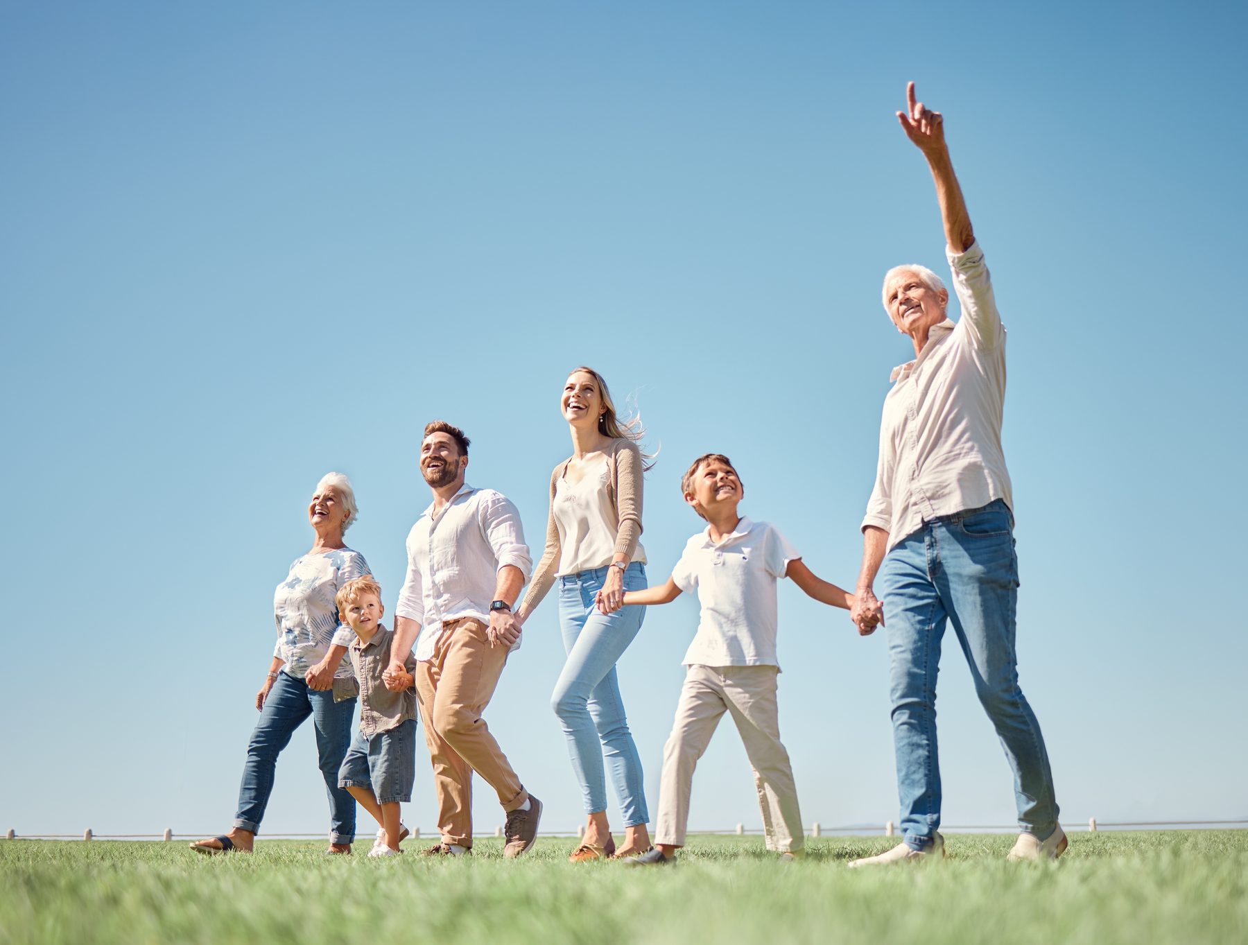Three generations of a family walking together